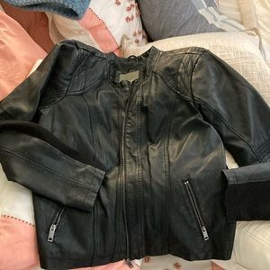 Faux black leather jacket.